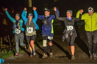 Night runners holding hands together at One Fyne Night