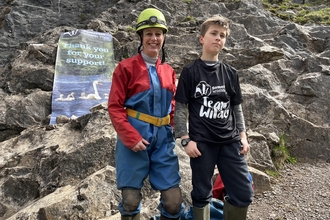 Georgia and her son Raf geared up to go caving for nature