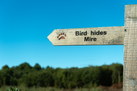Sign at Westhay Moor pointing to the bird hides and mire