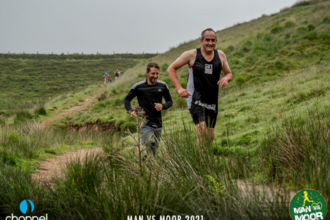 Chris and Steve running through hilly Exmoor