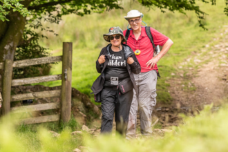 Lucy walking through a gate at the Exmoor Perambulation