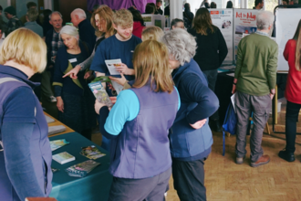 People gathered at the Wilder Coast Project event