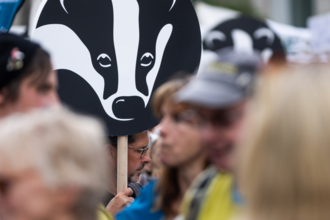 Placard in the shape of The Wildlife Trusts logo.