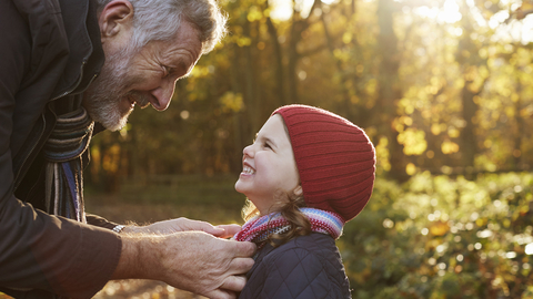 Image of a grandfather with his granddaughter