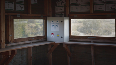 Digital information point installed inside a hide at Westhay Moor National Nature Reserve
