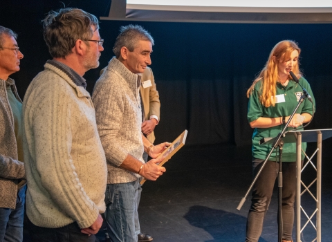 Members of the Reptile and Amphibian Group receiving their award from Rhiannon Route