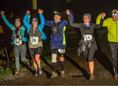 Night runners holding hands together at One Fyne Night