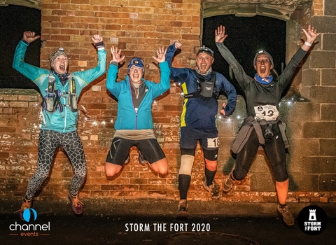 Night runners leaping in the air at Brean Fort