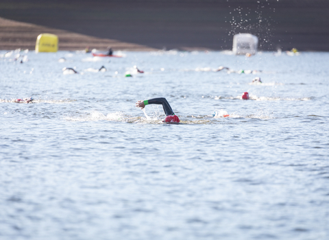 Swimmers at Wimbleball lake at the exmoor swim