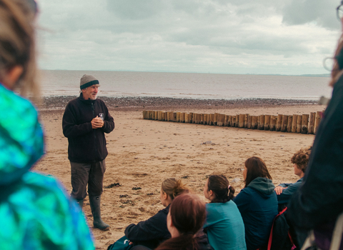 Mark Ward addressing a group of volunteers at a Shoresearch event at Dunster beach