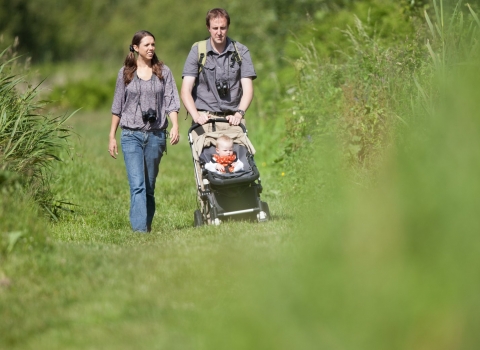 family walking through reserve