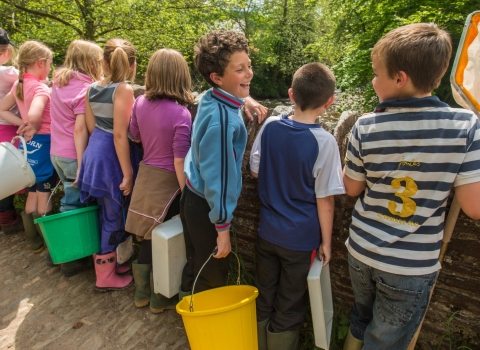 Children ready to do river sampling